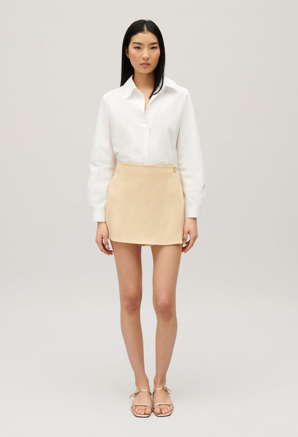 Claudie Pierlot | Falda short cruzada en beige para mujer.