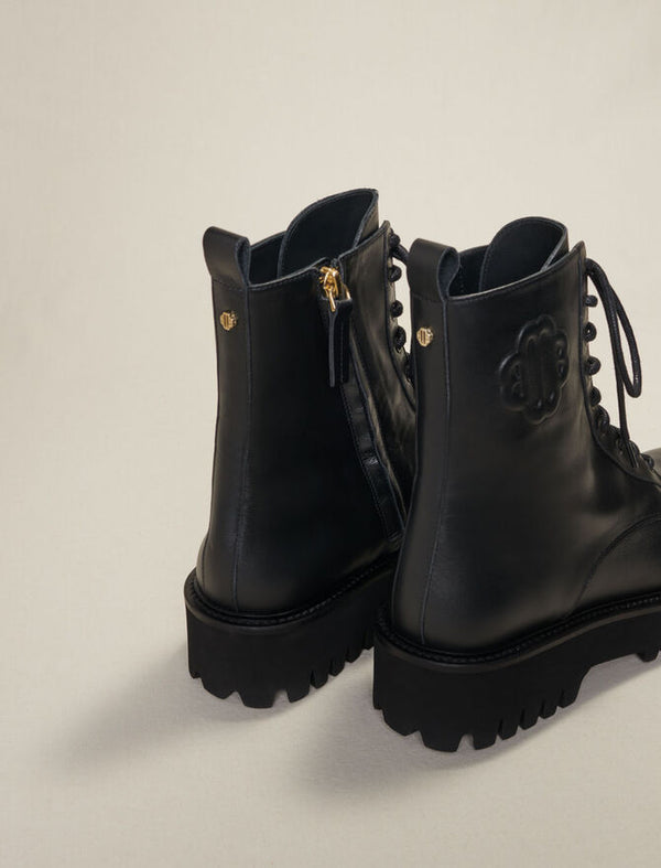 Maje | Botines negros de piel con cordones para mujer.