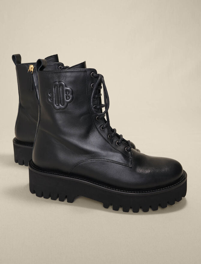 Maje | Botines negros de piel con cordones para mujer.