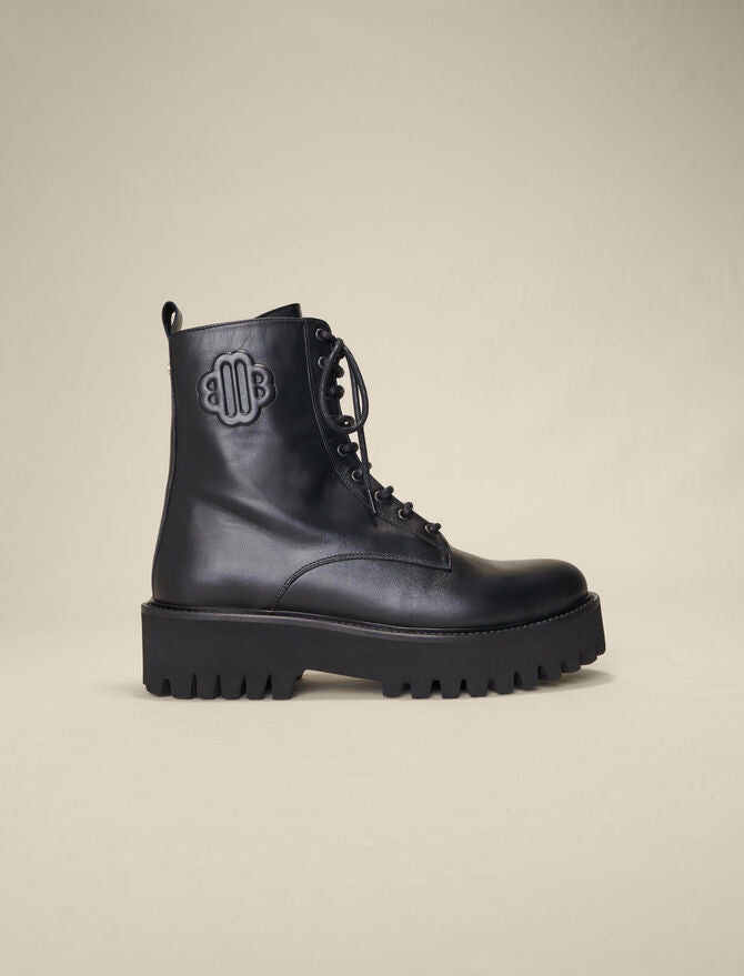 Maje | Botines negros de piel con cordones para mujer.