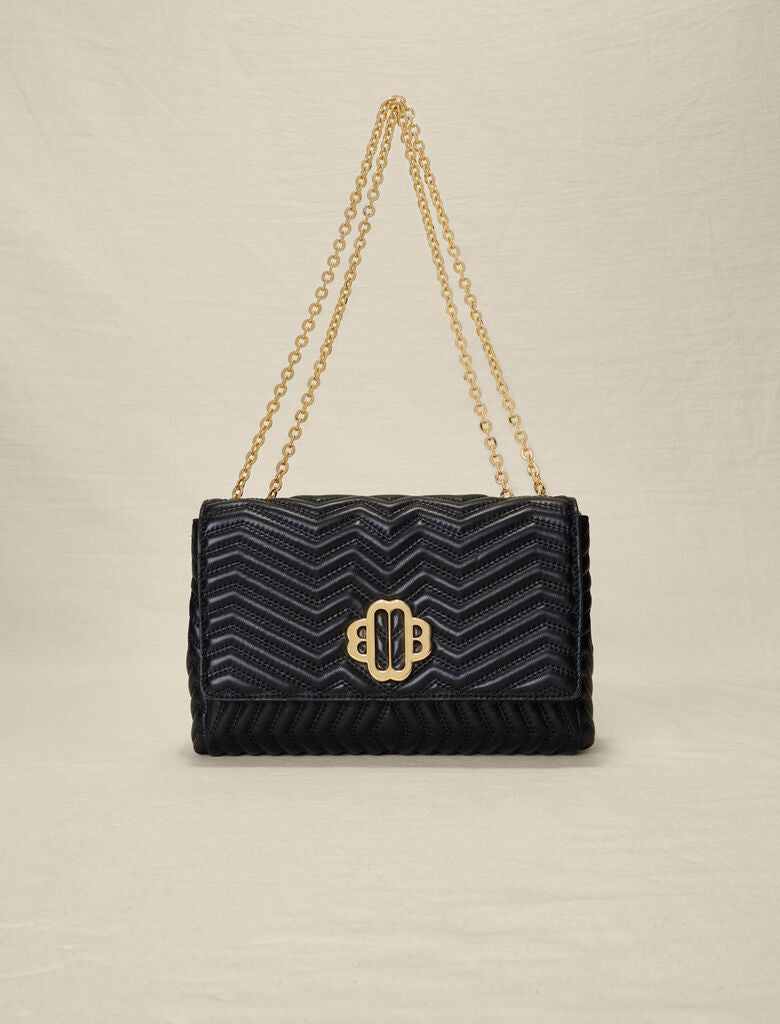 Bolso de piel con cadena