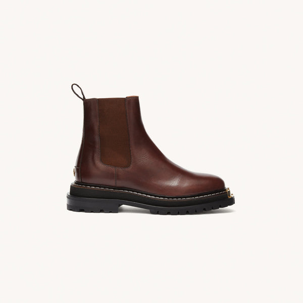 Botas de piel de suela de goma dentada