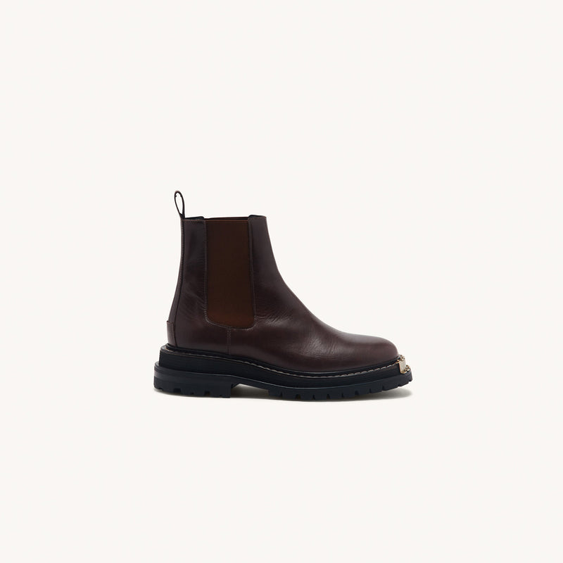 Botas de piel de suela de goma dentada