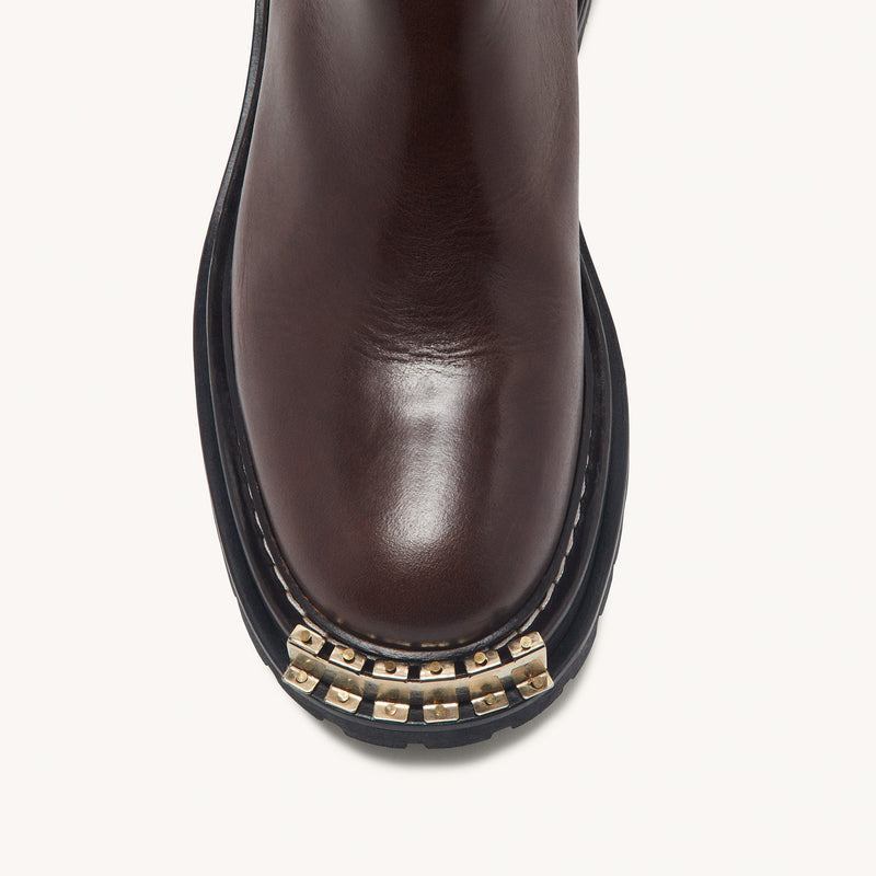Botas de piel de suela de goma dentada