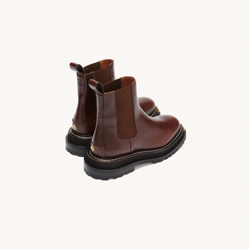Botas de piel de suela de goma dentada