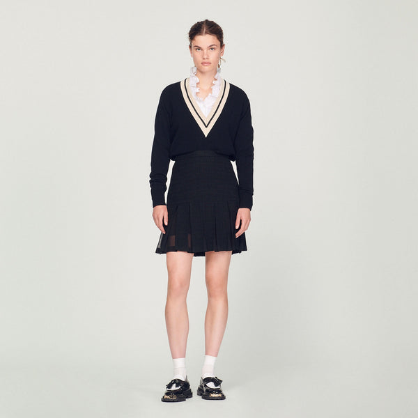 Falda de tweed con pliegues