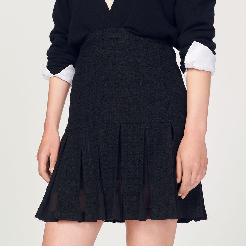 Falda de tweed con pliegues
