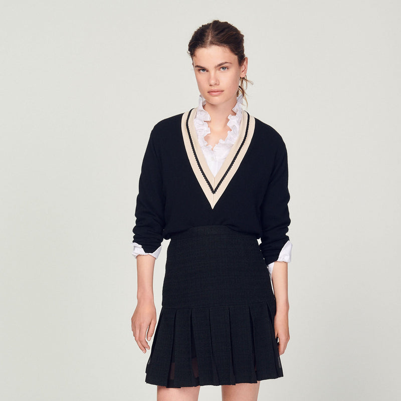Falda de tweed con pliegues