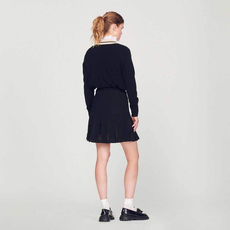 Falda de tweed con pliegues