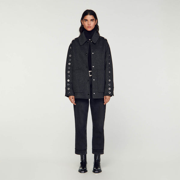 Abrigo oversize con ojales