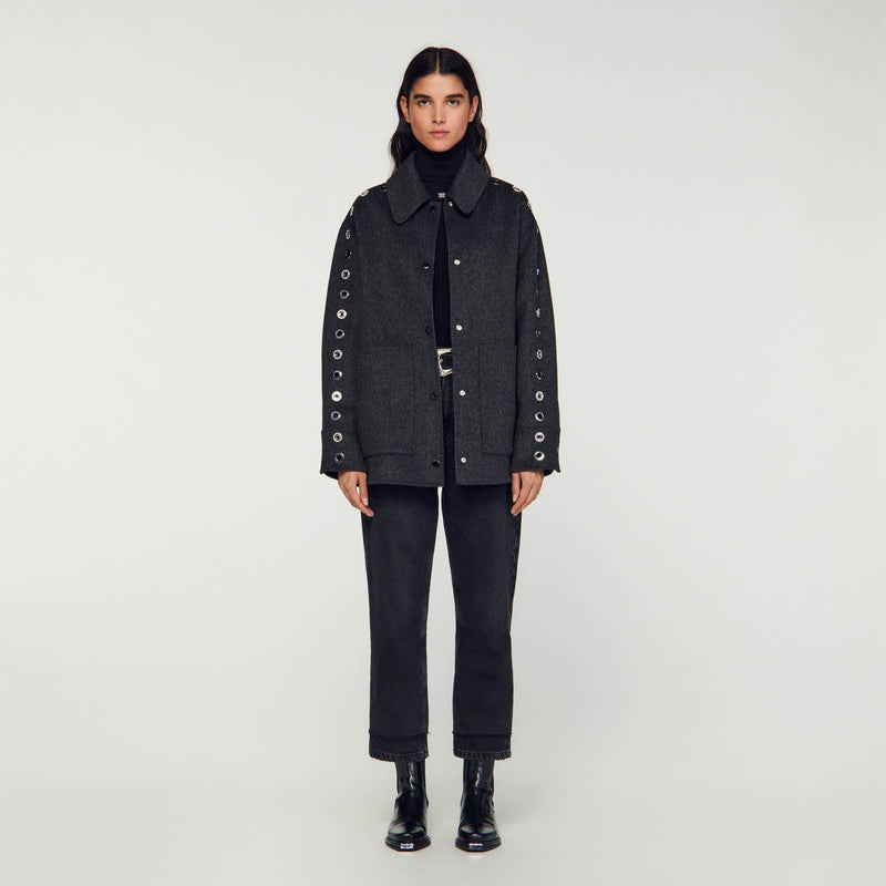 Abrigo oversize con ojales