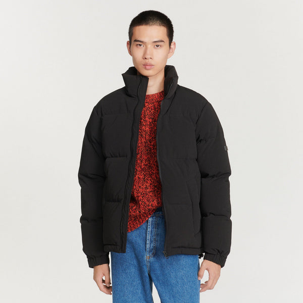 Sandro | Plumífero oversize de tejido técnico para hombre.