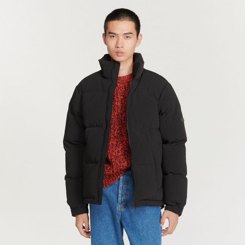 Sandro | Plumífero oversize de tejido técnico para hombre.