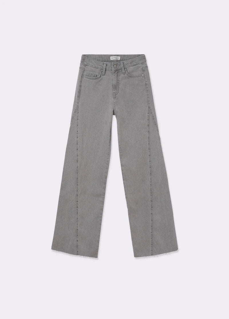 Pantalón corte lateral tachas