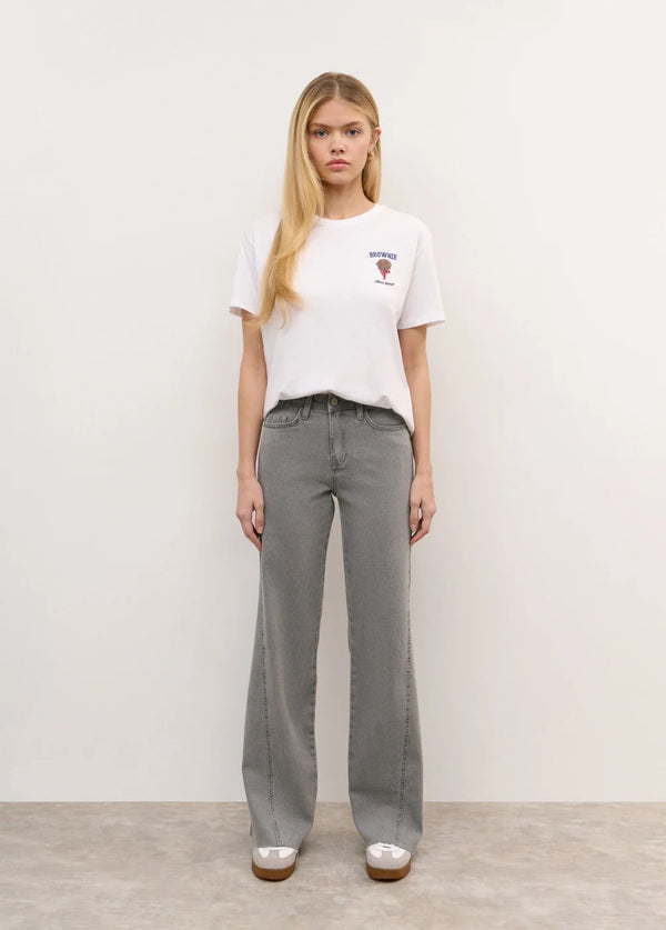 Pantalón corte lateral tachas