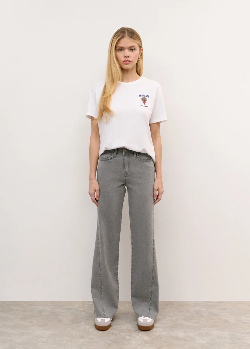 Pantalón corte lateral tachas