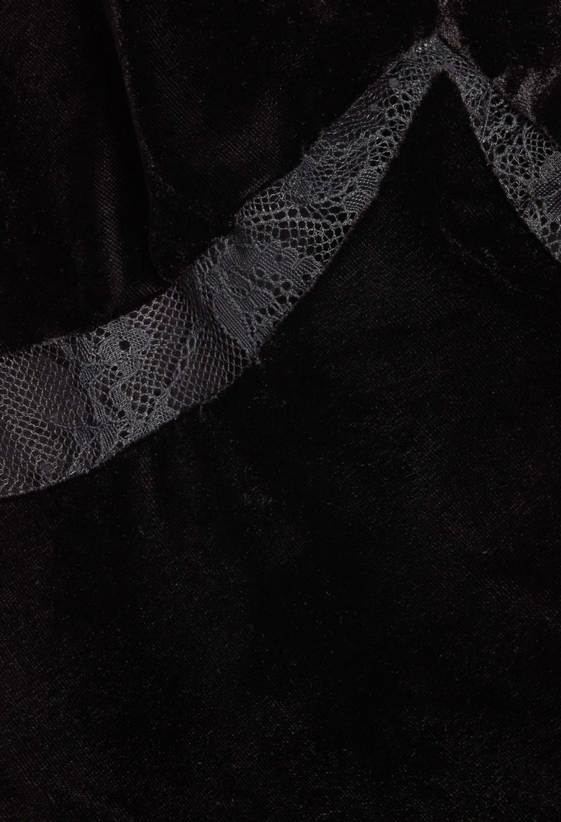 Camisola de terciopelo negro